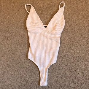 white bodysuit